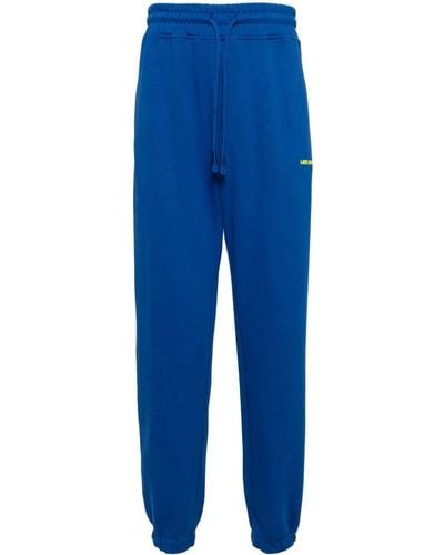 Les Benjamins Pantalon de jogging à logo imprimé - Bleu