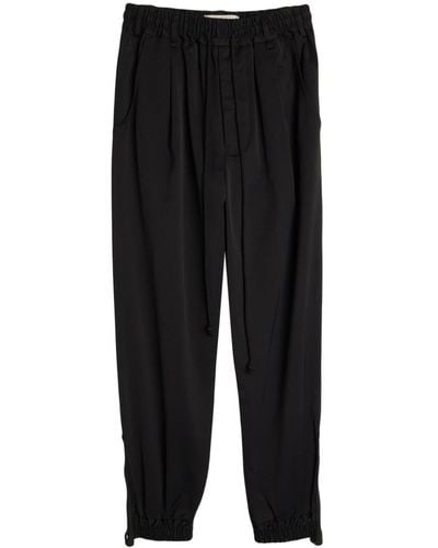 Song For The Mute Tapered-Hose mit Logo-Patch - Schwarz