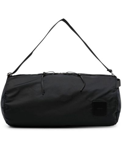 Jil Sander Logo-patch Circular Duffle Bag - Black