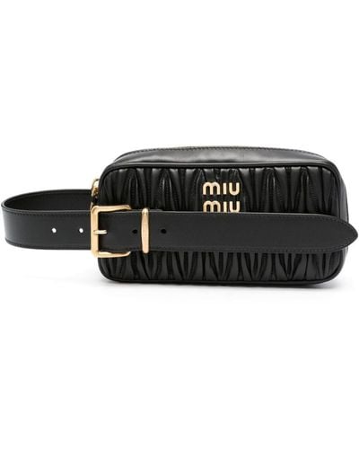 Miu Miu Handtasche mit Logo-Schild - Schwarz
