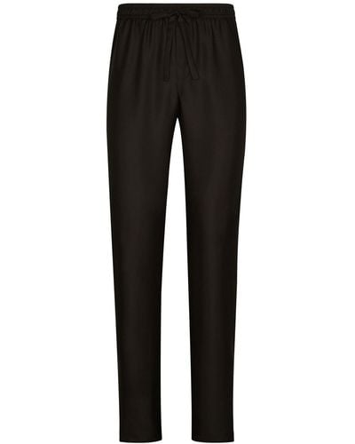 Dolce & Gabbana Pantalon de jogging en soie à logo brodé - Noir
