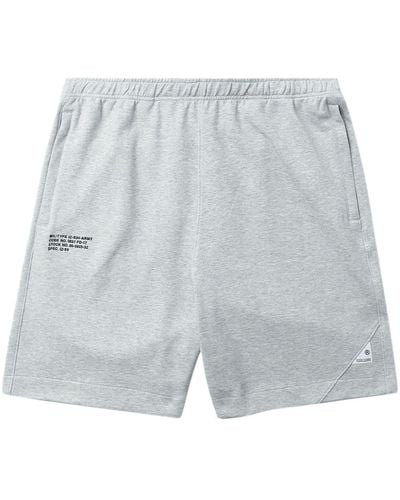 Izzue Pantalones cortos de chándal con logo - Gris