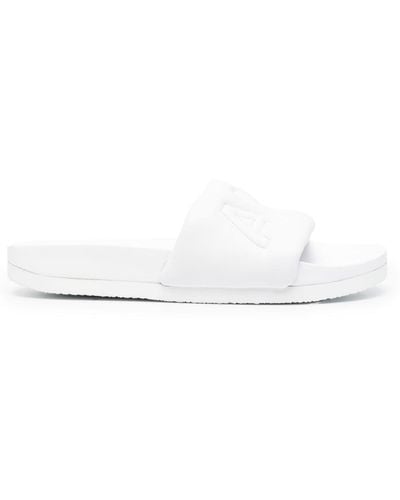 Ambush Claquettes en cuir à logo matelassé - Blanc