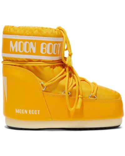 Moon Boot Bottines lacées à logo imprimé - Jaune