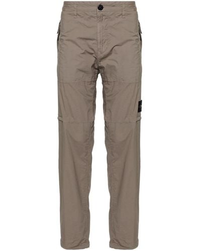 Stone Island Pantalones ajustados con distintivo Compass - Gris