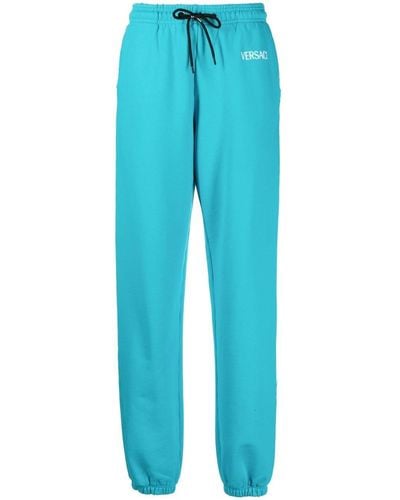 Versace Pantalon de jogging à logo imprimé - Bleu