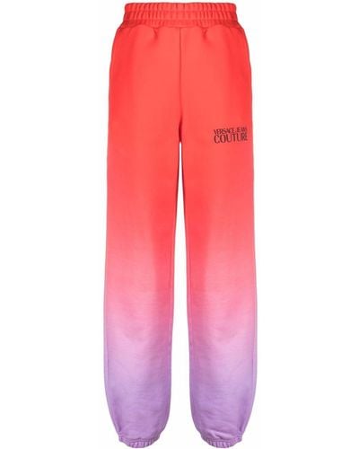 Versace Pantaloni sportivi con effetto sfumato - Rosso