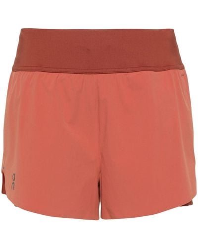 On Shoes Pantalones cortos de deporte con logo reflectante - Rojo