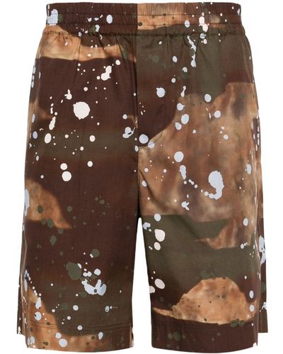 MSGM Pantalones cortos con motivo de salpicadura de pintura - Marrón