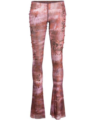 Jean Paul Gaultier Pantaloni svasati semi trasparenti x KNWLS - Rosso