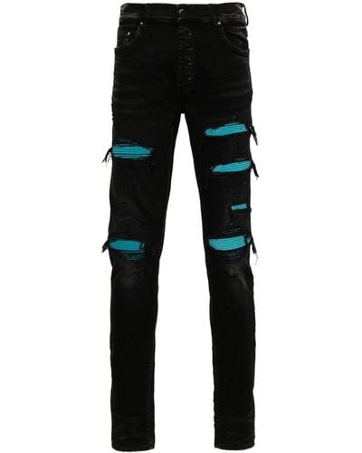 Amiri Suede-embellished skinny jeans - Noir