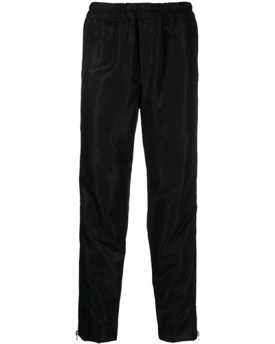 COMME DES GARÇON BLACK Pantalones con cremallera lateral - Negro
