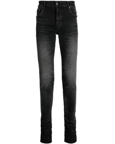 Amiri Stack Whiskered Skinny Jeans - Black