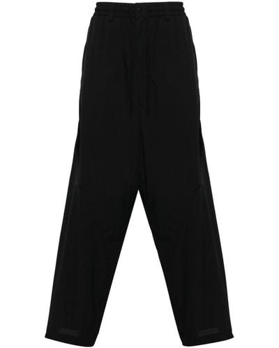 Y-3 Pantalones de chándal con logo estampado - Negro