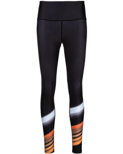 https://cdna.lystit.com/400/500/tr/photos/farfetch/a07887ab/pe-nation-designer-black-Wave-Form-Print-leggings.jpeg