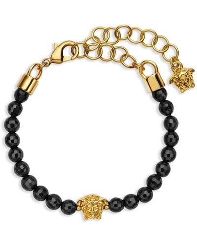 Versace Bracelet de perles à breloque Medusa - Métallisé