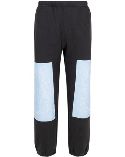 Supreme X The North Face pantalon de jogging - Bleu
