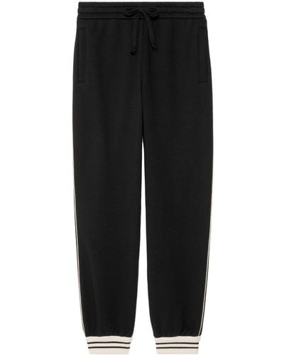 Gucci Pantalon de jogging en coton à logo GG - Noir