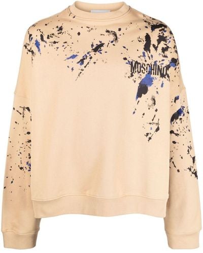 Moschino Sweater Met Logoprint En Verfspatten - Naturel