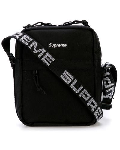 Supreme logo-patch Duffle Bag - Farfetch