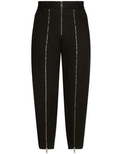 Dolce & Gabbana Pantalones ajustados con parche del logo - Negro