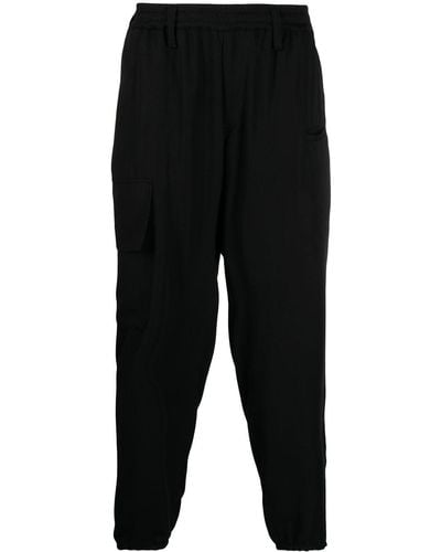 Yohji Yamamoto Pantalon de jogging à coupe crop - Noir
