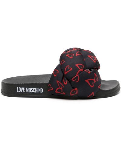 Love Moschino Claquettes à cœurs imprimés - Noir