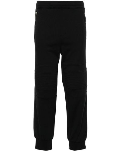 Neil Barrett Pantalon de jogging à détails de coutures - Noir