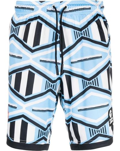 Marcelo Burlon Pantalones cortos de chándal con cordones - Azul