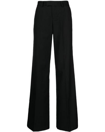 Kiki de Montparnasse Pantalon évasé en laine à taille haute - Noir