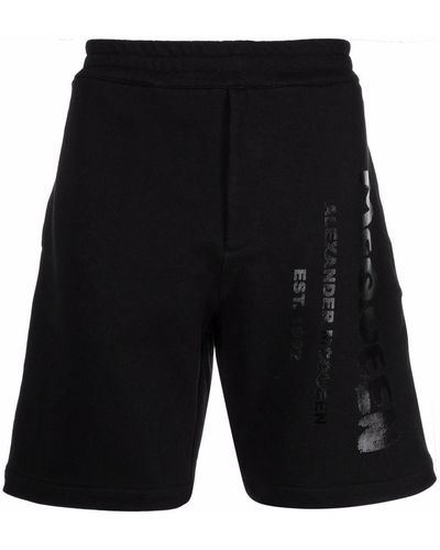 Alexander McQueen Short de sport à logo imprimé - Noir