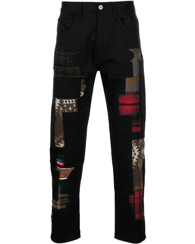 Junya Watanabe Pantalones skinny con detalle de patchwork - Negro