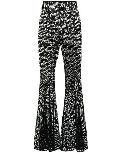 Mugler Pantalones con estampado de estrellas - Negro