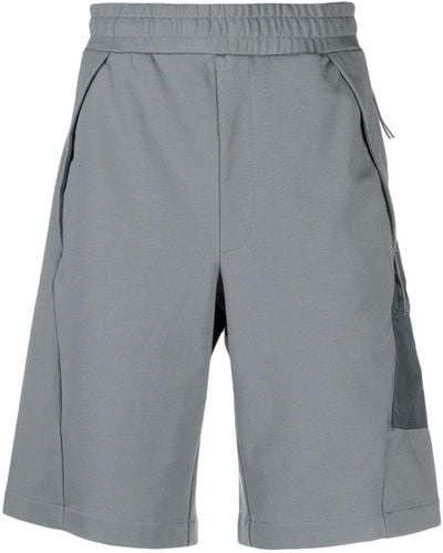 C.P. Company Pantalones cortos de deporte con bolsillo cargo - Gris