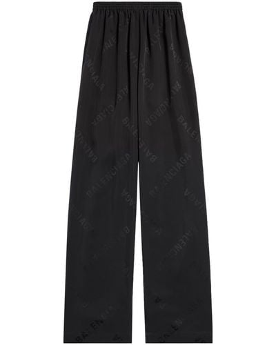 Balenciaga Pantalones anchos con logo en jacquard - Negro