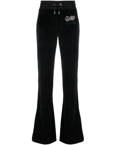 Moschino Jeans Pantalon de jogging évasé à logo brodé - Noir
