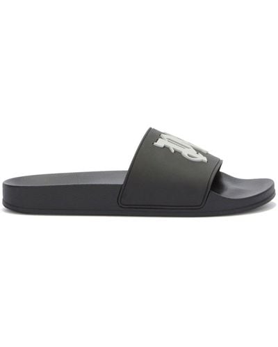 Palm Angels Sandali slides con monogramma goffrato - Nero