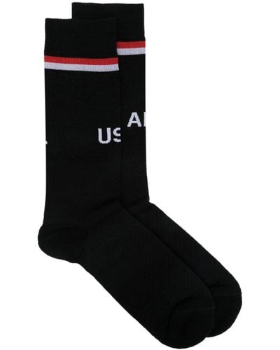 Ambush Chaussettes à logo en intarsia - Noir