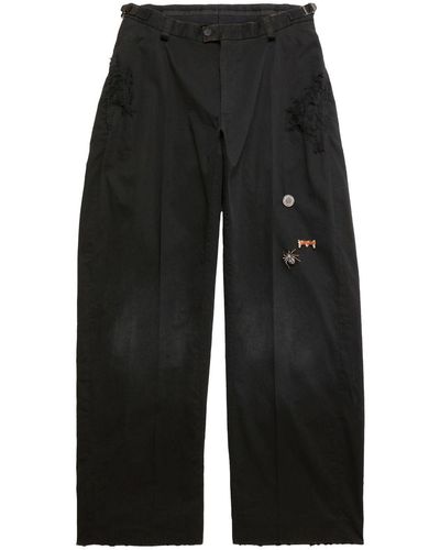 Balenciaga Pantalones holgados con detalle de parche - Negro