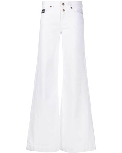 Versace Jeans Couture Vaqueros anchos con parche del logo - Blanco