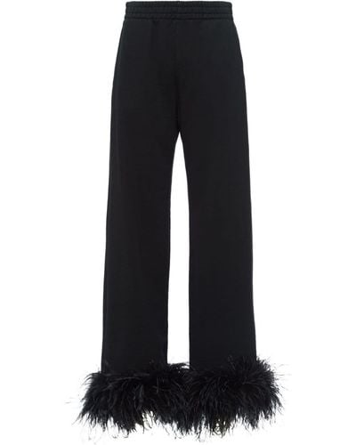 Prada Pantalon de jogging bordé de plumes - Noir