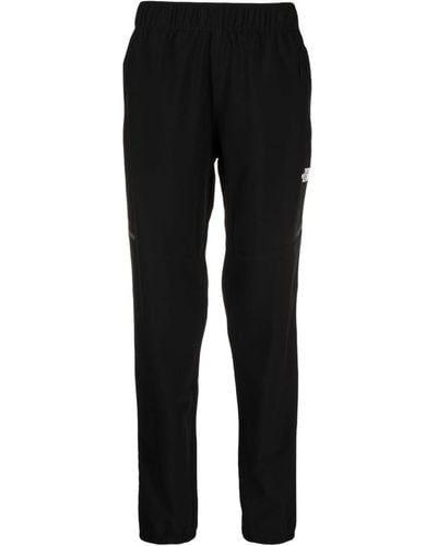 The North Face Pantalones elásticos con logo estampado - Negro