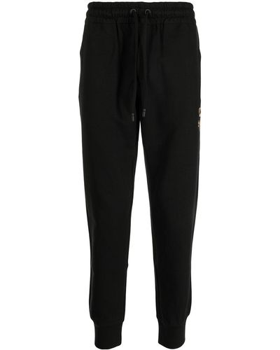 Dolce & Gabbana Pantalones cortos de deporte con insignia bordada - Negro