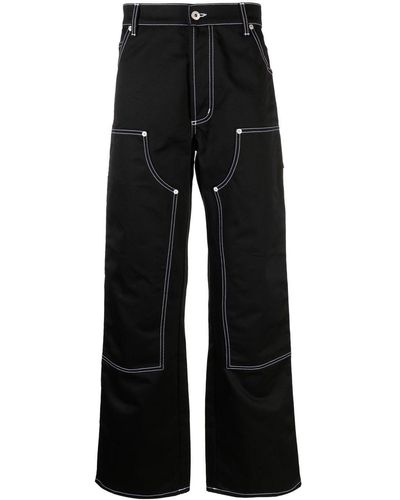 Heron Preston Pantalones anchos con costuras en contraste - Negro