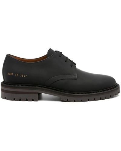 Common Projects Zapatos derby con número de serie estampado - Negro