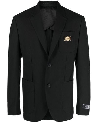 Versace Blazer nero monopetto con placca logo