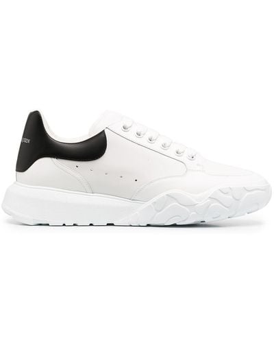 Alexander McQueen Zapatillas deportivas blancas/negras de cuero - Blanco