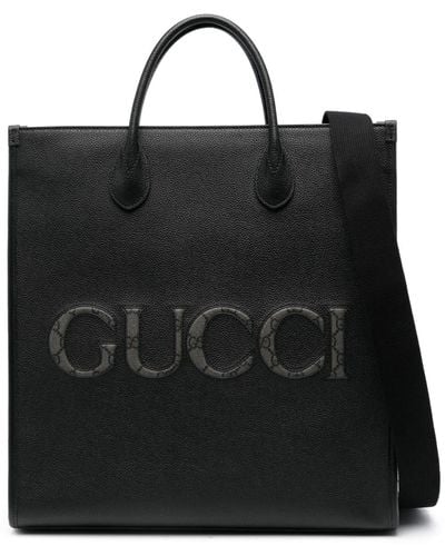 Gucci Sac cabas en cuir à logo embossé - Noir