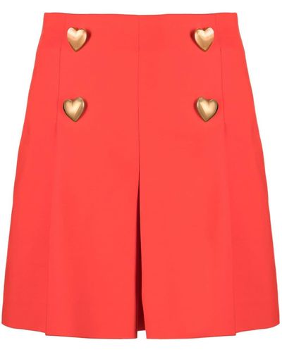 Moschino Pantalones cortos con detalle de botones en forma de corazón - Rojo
