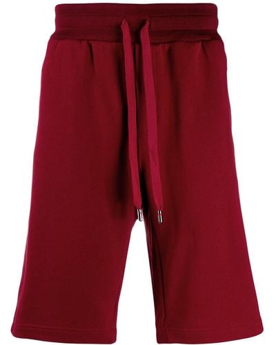 Dolce & Gabbana Shorts sportivi con applicazione - Rosso